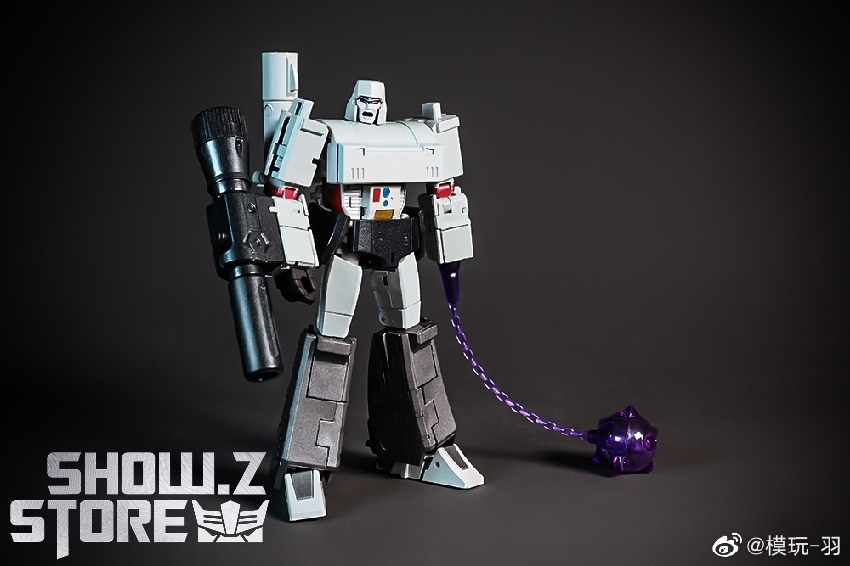 Gray commander figure with articulated limbs and purple energy attachment Gray commander figure with articulated limbs and purple energy attachment
