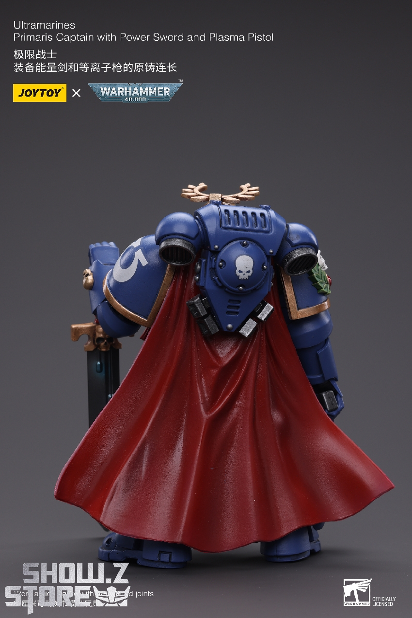 Rear view showing ornate backpack and armor plating details Rear view showing ornate backpack and armor plating details