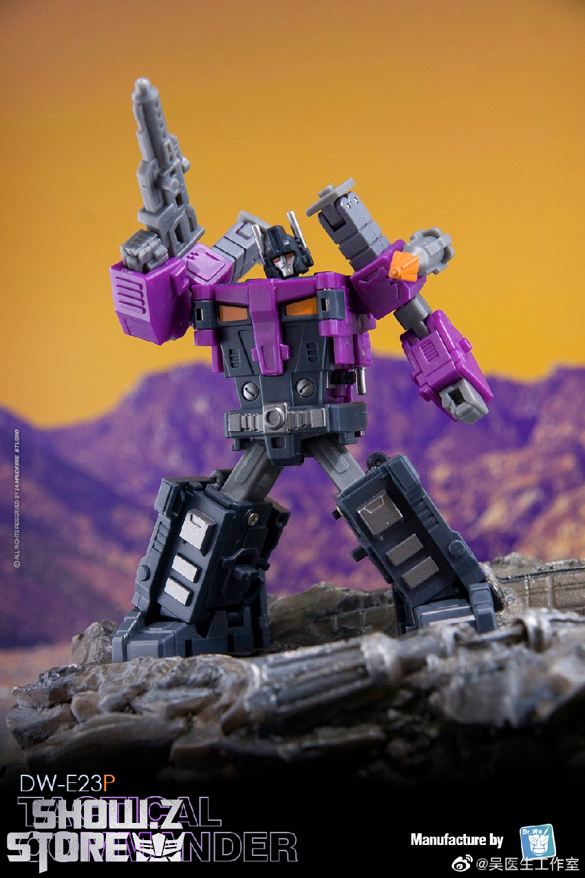 Highly detailed purple and black mecha figure with extended weapon accessories Highly detailed purple and black mecha figure with extended weapon accessories