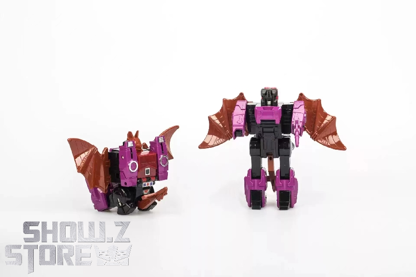 4th Party Transformers G1 Mindwipe purple pink robot in vehicle mode displayed front angle 4th Party Transformers G1 Mindwipe purple pink robot in vehicle mode displayed front angle