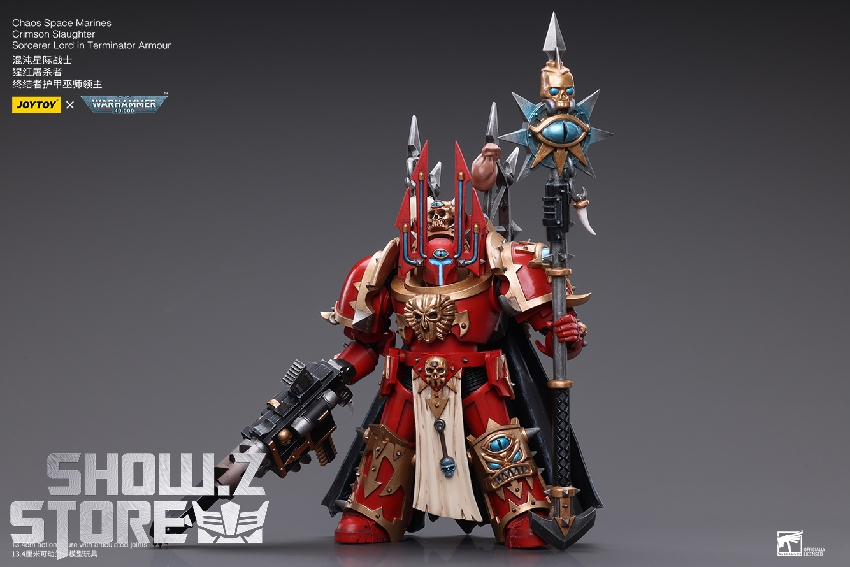 Front-facing Chaos Space Marine warrior showing ornate red and gold armor with weapons Front-facing Chaos Space Marine warrior showing ornate red and gold armor with weapons