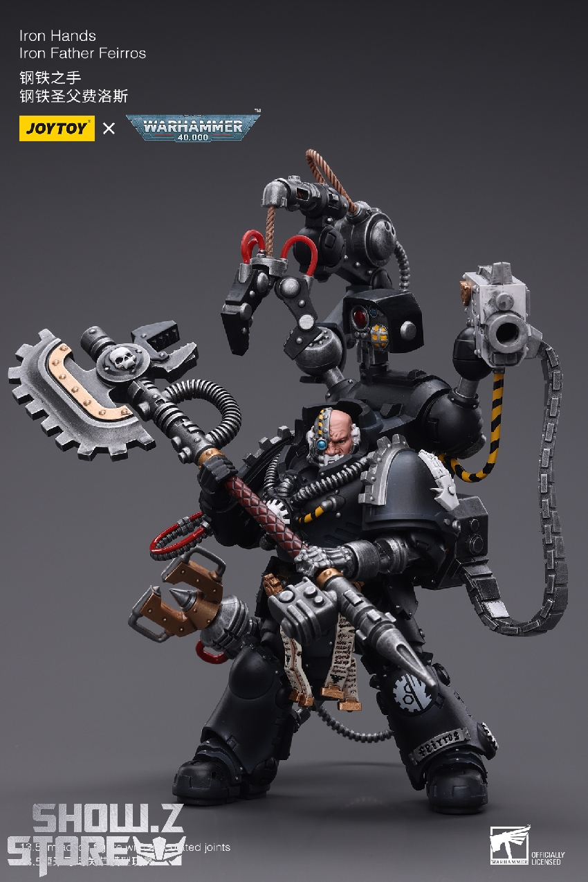 Iron hands space marine in dark blue and gold armor with multiple combat accessories Iron hands space marine in dark blue and gold armor with multiple combat accessories