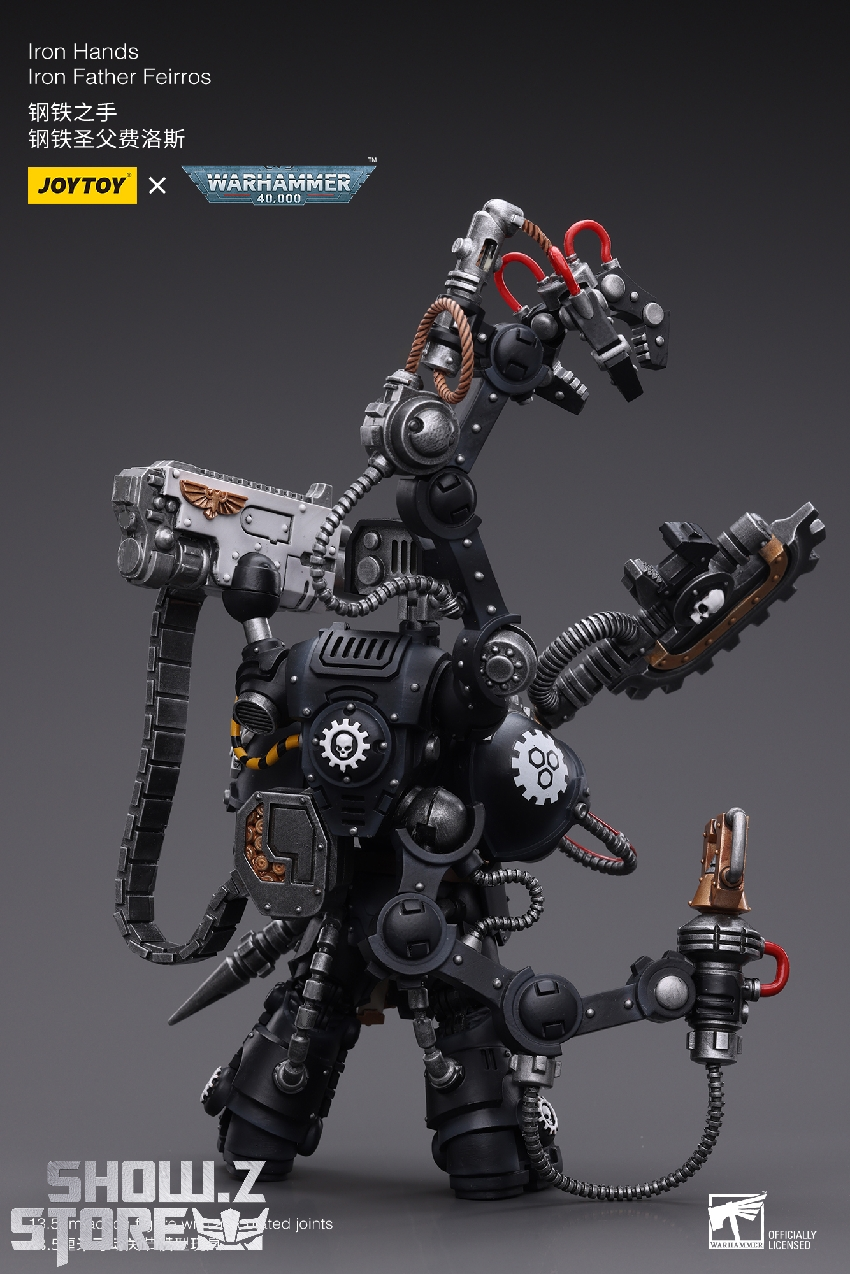Warhammer character with detailed mechanical components and heavy weapon configuration Warhammer character with detailed mechanical components and heavy weapon configuration
