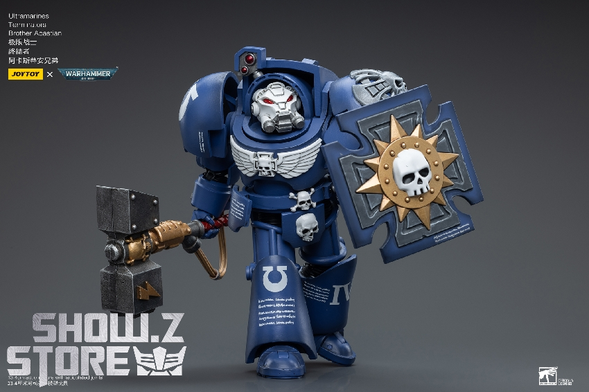 Blue warhammer terminator figure with ornate shield and chain weapon Blue warhammer terminator figure with ornate shield and chain weapon