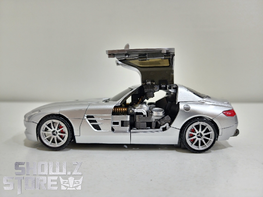 White luxury vehicle displayed in horizontal conversion mode White luxury vehicle displayed in horizontal conversion mode