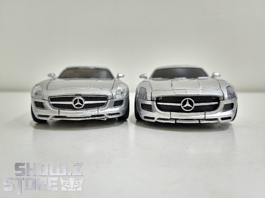 Comparison of two white luxury car toys side by side Comparison of two white luxury car toys side by side