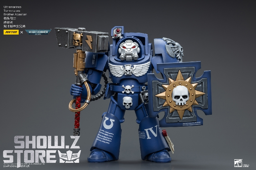 Blue armored space marine terminator holding glowing shield and weapon Blue armored space marine terminator holding glowing shield and weapon