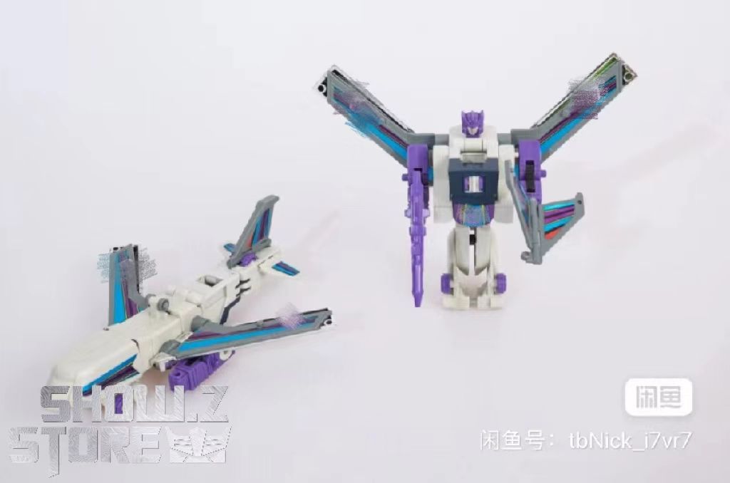 White jet form Octane with purple and blue accent stripes throughout White jet form Octane with purple and blue accent stripes throughout