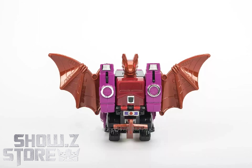 Mindwipe purple robot in action pose with extended wings and dynamic battle stance position Mindwipe purple robot in action pose with extended wings and dynamic battle stance position