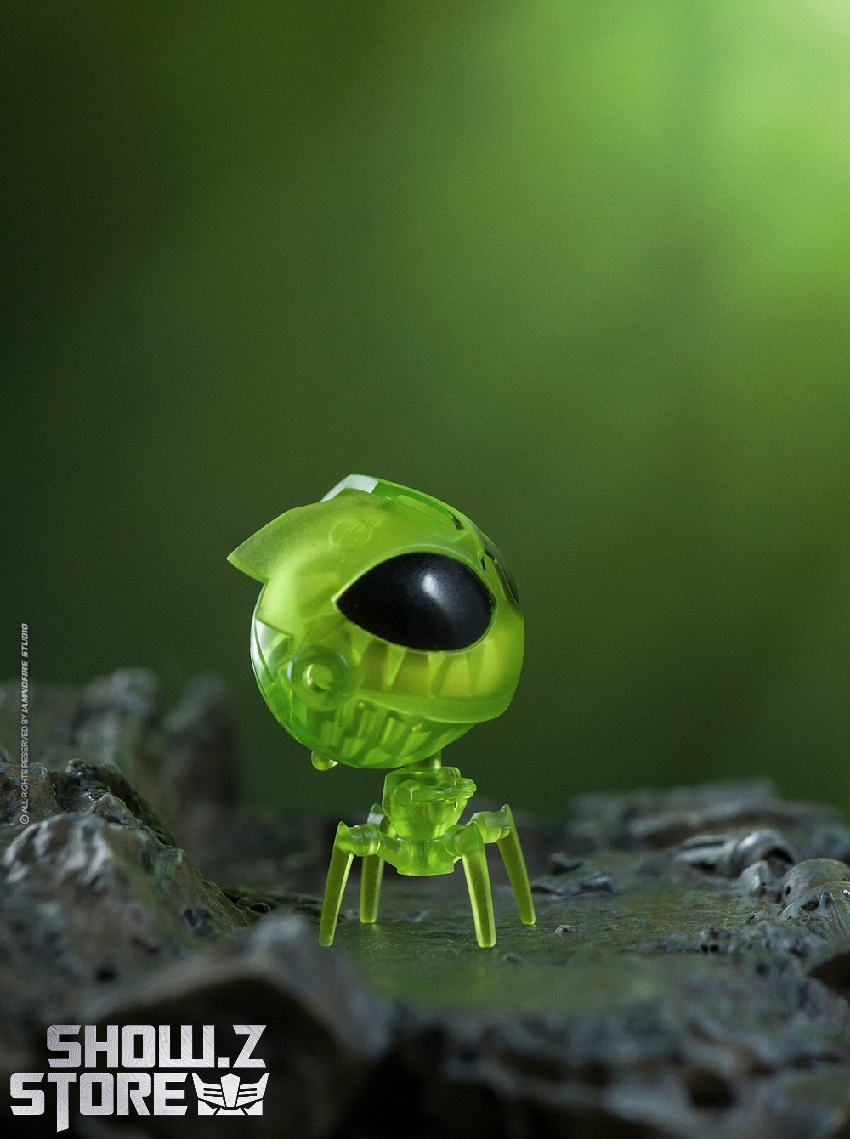 Top-down view of transparent green insect robot showing articulated limbs and mechanics Top-down view of transparent green insect robot showing articulated limbs and mechanics