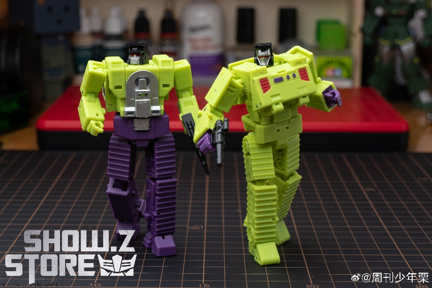 Magic Square yellow lime robot in dynamic action pose on stage platform Magic Square yellow lime robot in dynamic action pose on stage platform