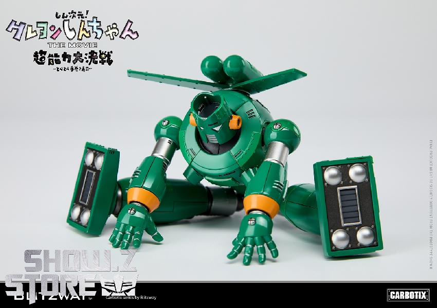 Green robot front view with detailed armor and orange accent bands Green robot front view with detailed armor and orange accent bands