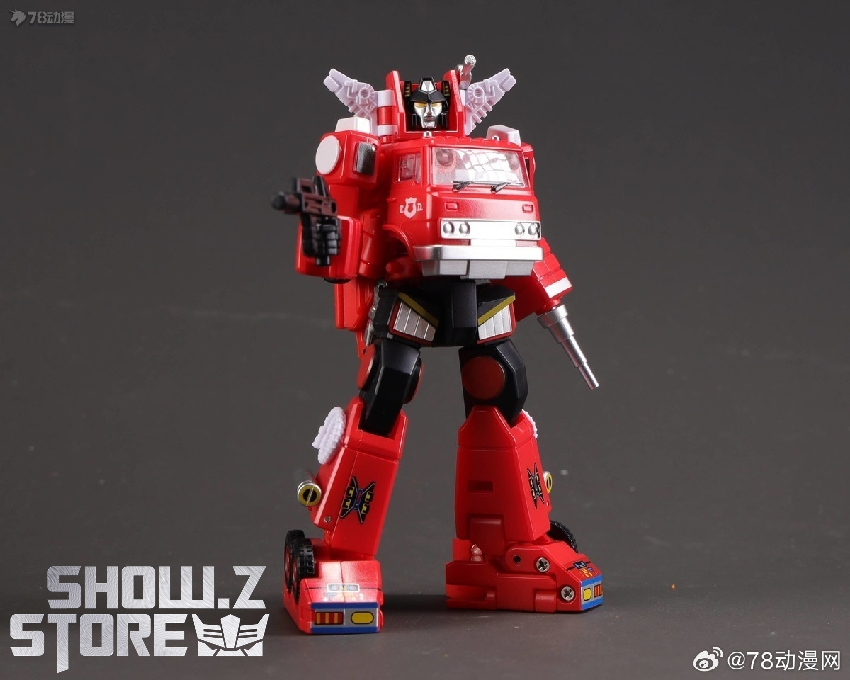 Set containing orange robot and red robot figures together Set containing orange robot and red robot figures together
