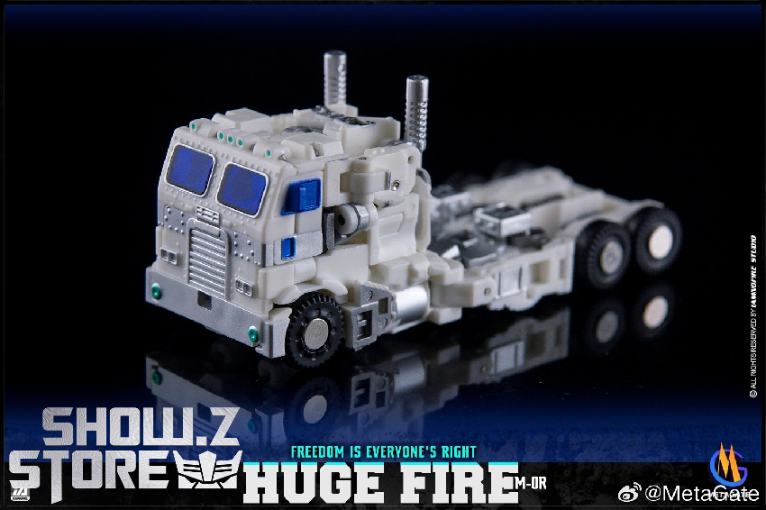 Metagate M-01R White Fire Optimus Prime truck mode on black studio background Metagate M-01R White Fire Optimus Prime truck mode on black studio background