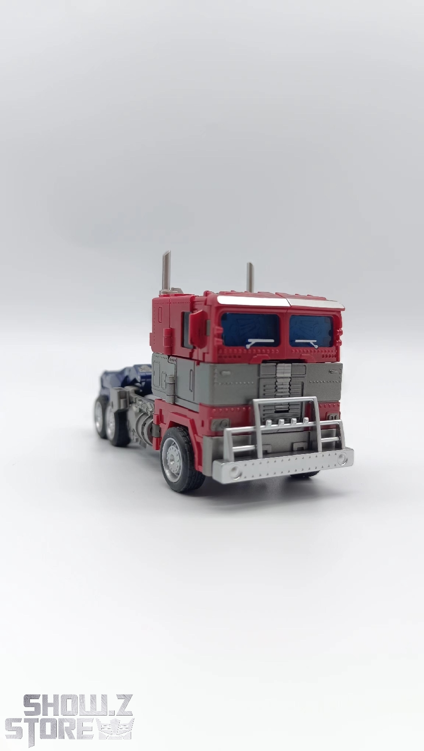 Optimus Prime robot mode front view showing red chest and blue lower body armor Optimus Prime robot mode front view showing red chest and blue lower body armor