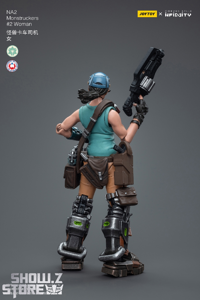 Military operator in teal armor with large assault rifle weapon Military operator in teal armor with large assault rifle weapon