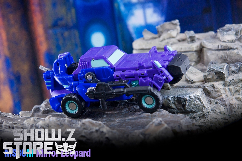 Blue purple robot figure in alternate beast mode configuration Blue purple robot figure in alternate beast mode configuration