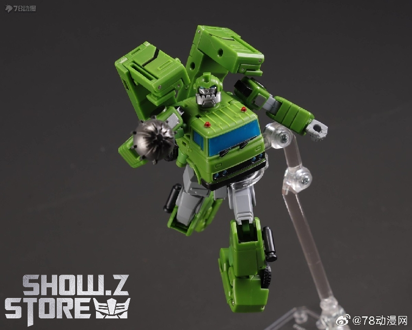 Newage H47P green black tank robot in humanoid warrior form with weapon systems Newage H47P green black tank robot in humanoid warrior form with weapon systems