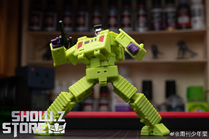Magic Square lime green robot in standing pose with purple robot figure Magic Square lime green robot in standing pose with purple robot figure
