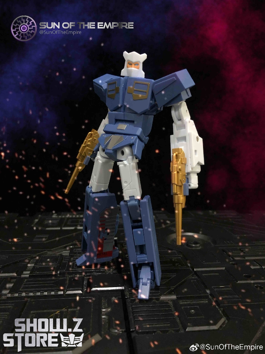 Blue humanoid robot figure with white shoulders and golden weapons in dynamic battle pose Blue humanoid robot figure with white shoulders and golden weapons in dynamic battle pose