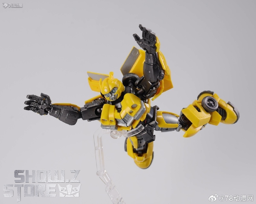 Blokees Transformers Bumblebee yellow and black robot figure in action stance Blokees Transformers Bumblebee yellow and black robot figure in action stance