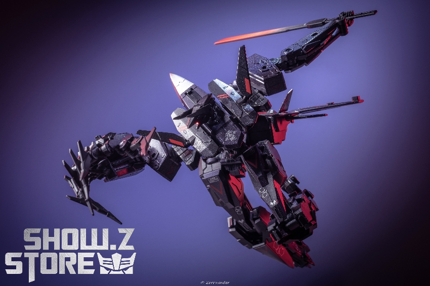Black insect-like robot with red and purple details in aggressive combat pose Black insect-like robot with red and purple details in aggressive combat pose