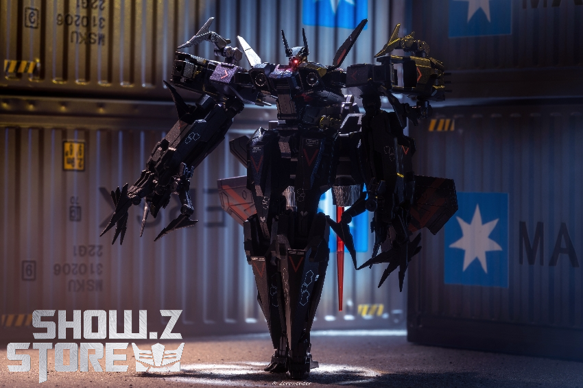 Purple background showing black spiky robot figure with red accents in action Purple background showing black spiky robot figure with red accents in action