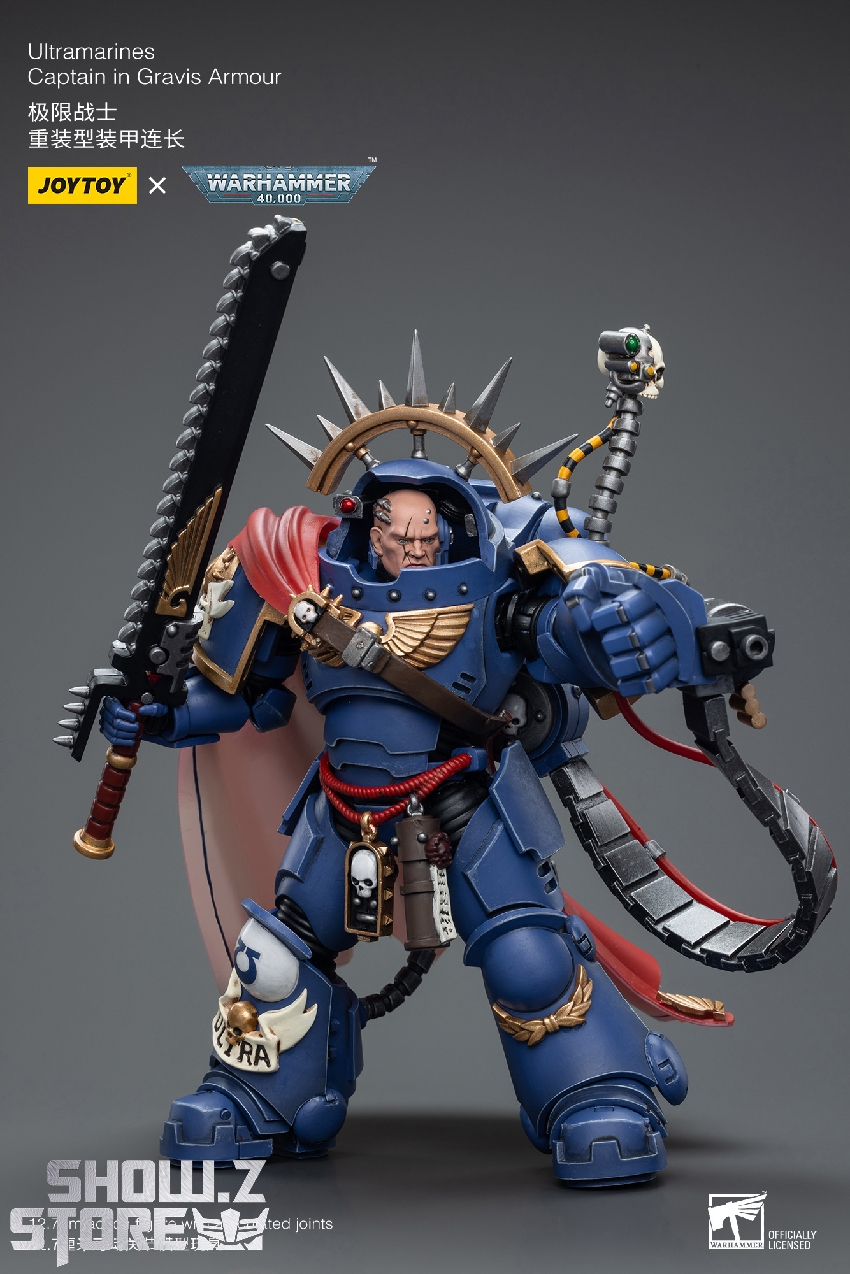 Captain Gravis Armor figure with sword and paired weapons in tactical stance configuration Captain Gravis Armor figure with sword and paired weapons in tactical stance configuration
