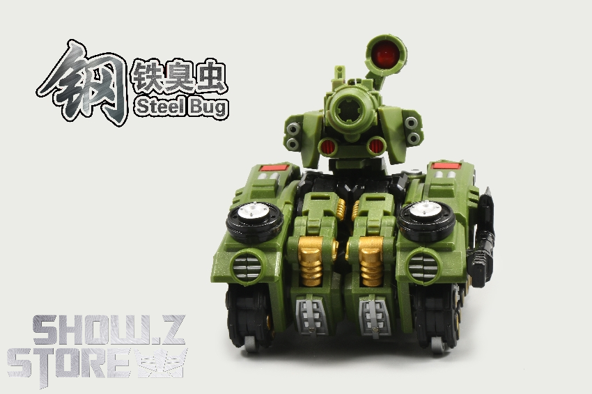 Front view compact beetle vehicle showing detailed weapon hardpoints and armor Front view compact beetle vehicle showing detailed weapon hardpoints and armor
