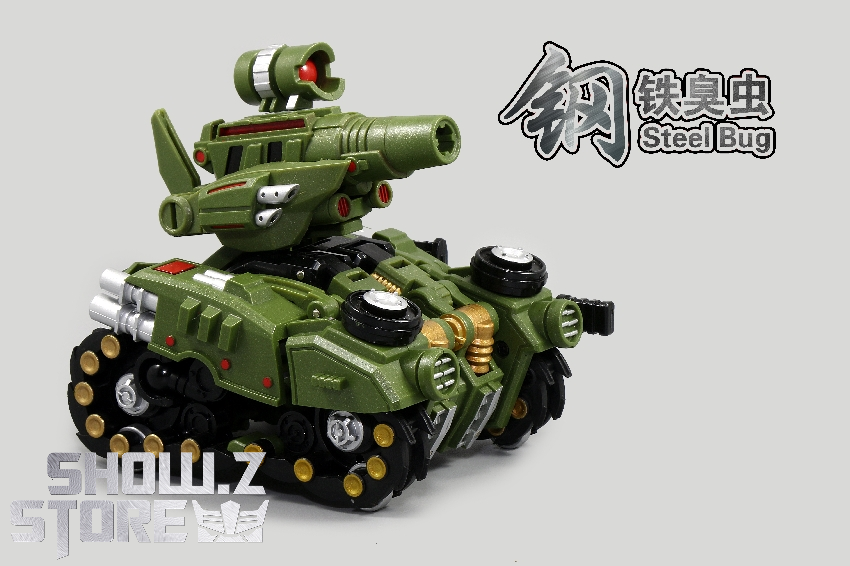 Large armored tank beetle with green body gold treads mounted weapon systems Large armored tank beetle with green body gold treads mounted weapon systems