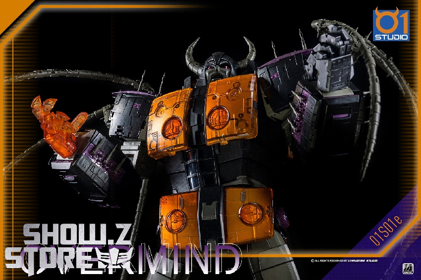 Orange and black Unicron robot figure in unified form Orange and black Unicron robot figure in unified form
