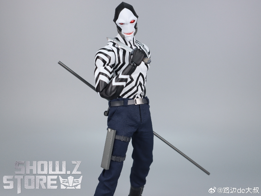 Adad side profile striped suit weapon accessories display Adad side profile striped suit weapon accessories display
