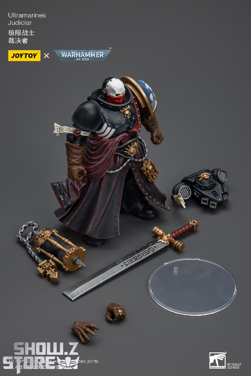 Space marine warrior holding ornate staff and energy weapon ready Space marine warrior holding ornate staff and energy weapon ready