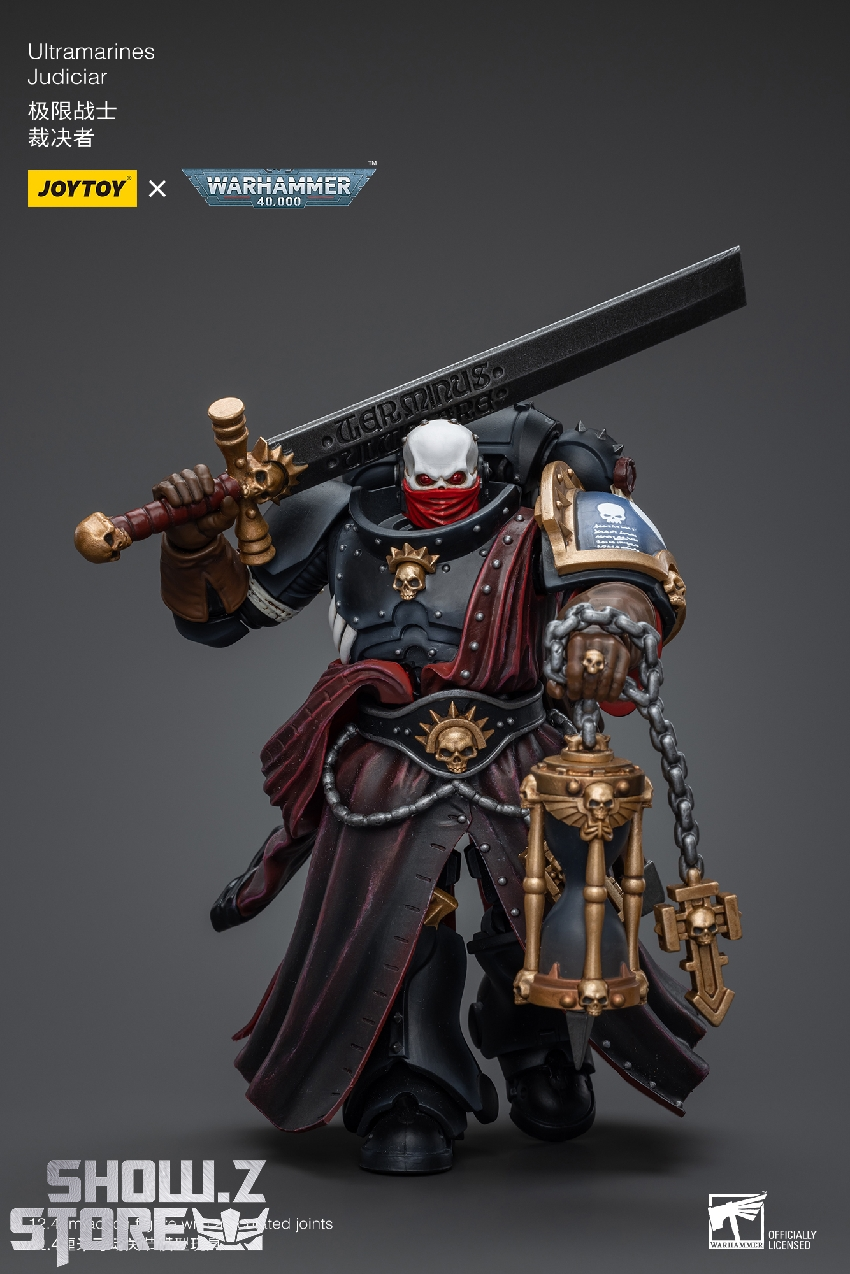 Detailed Warhammer 40K battle figure with blue and gold armor Detailed Warhammer 40K battle figure with blue and gold armor