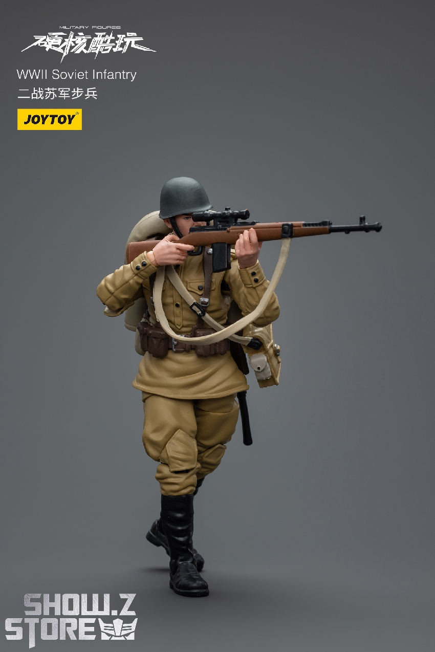 WWII Soviet soldier in tan uniform aiming rifle in combat position WWII Soviet soldier in tan uniform aiming rifle in combat position