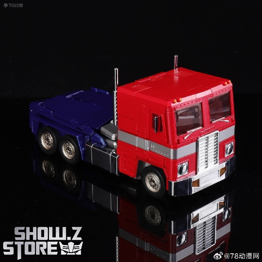 Optimus Prime robot figure with blue body red accents and golden cone head Optimus Prime robot figure with blue body red accents and golden cone head