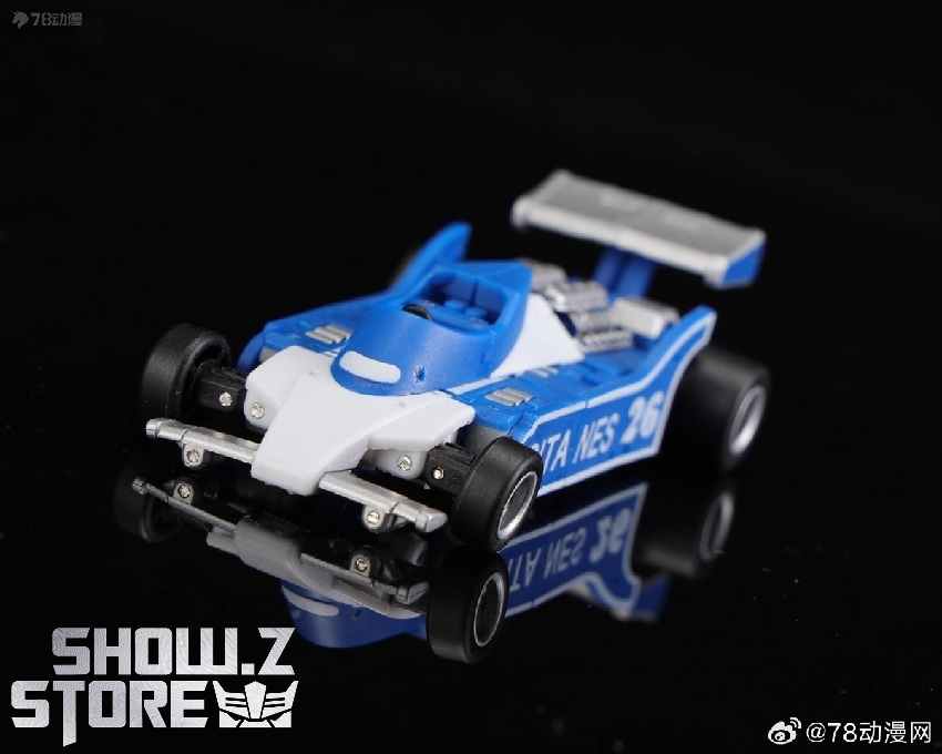 Blue and white race car model with black wheels and silver spoiler Blue and white race car model with black wheels and silver spoiler