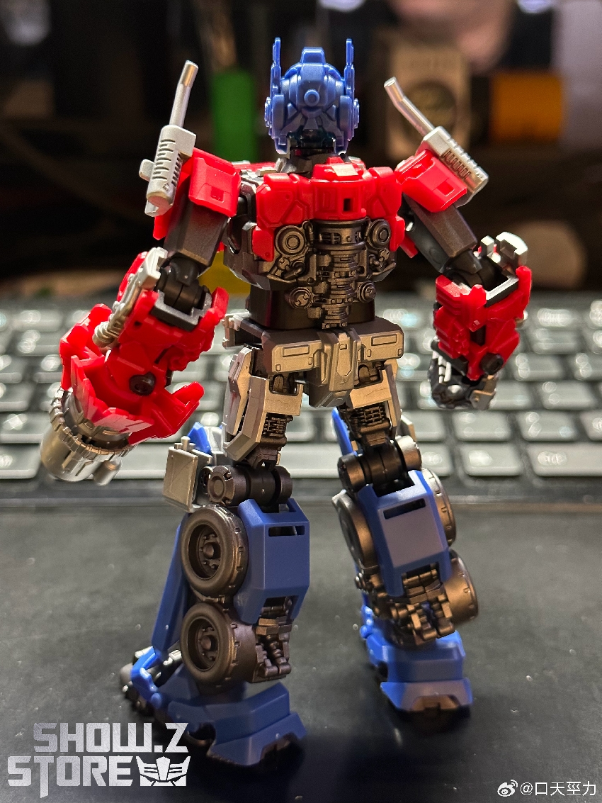 Transformer figure displaying detail-rich armor plating with metallic blue and red paint finish Transformer figure displaying detail-rich armor plating with metallic blue and red paint finish