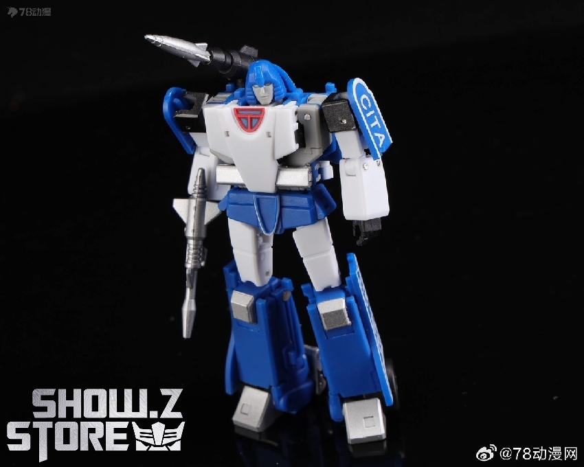 Robot in standing pose with rifle weapon and chest insignia Robot in standing pose with rifle weapon and chest insignia