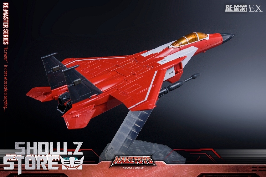 Detailed side profile of red fighter jet aircraft with orange accents and black wing elements Detailed side profile of red fighter jet aircraft with orange accents and black wing elements