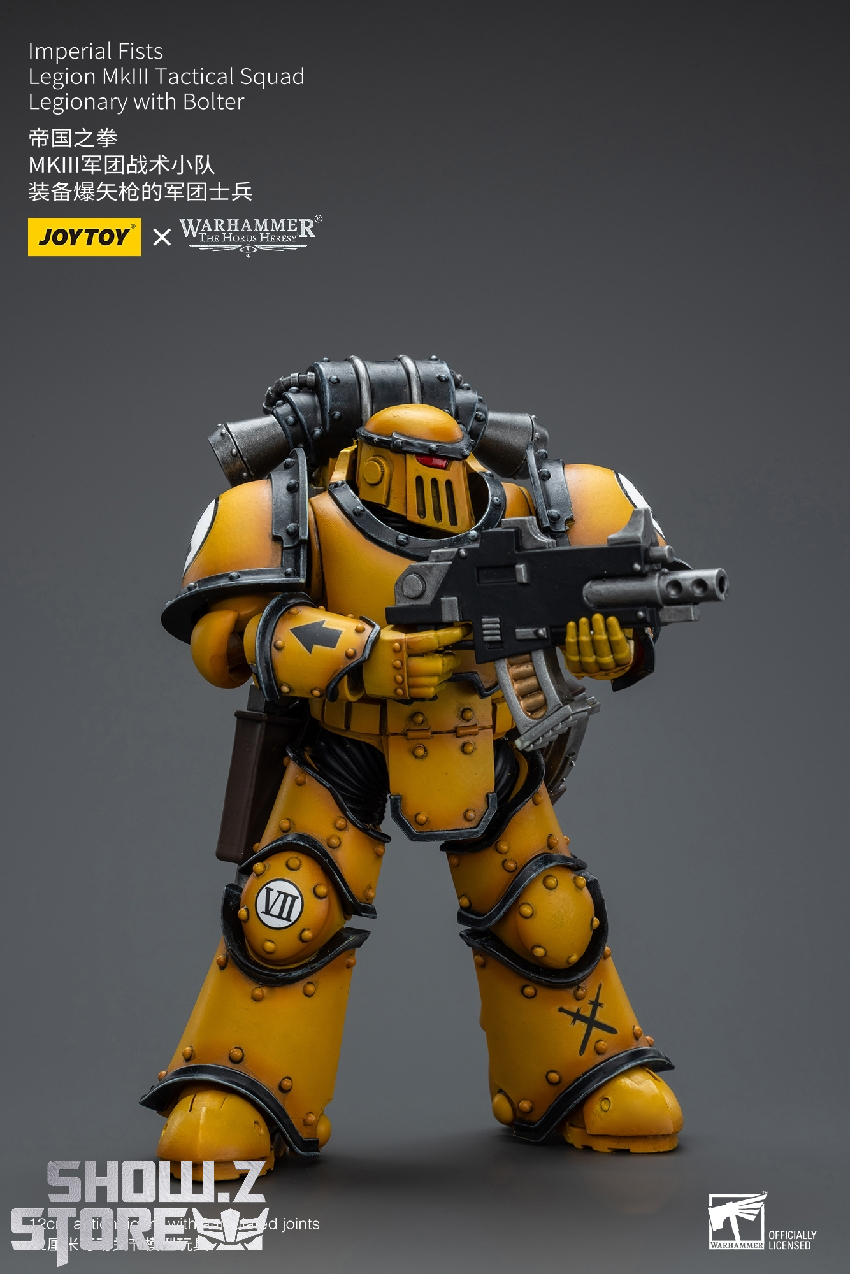 Detailed front view of yellow JoyToy Imperial Fists action figure with weapon Detailed front view of yellow JoyToy Imperial Fists action figure with weapon