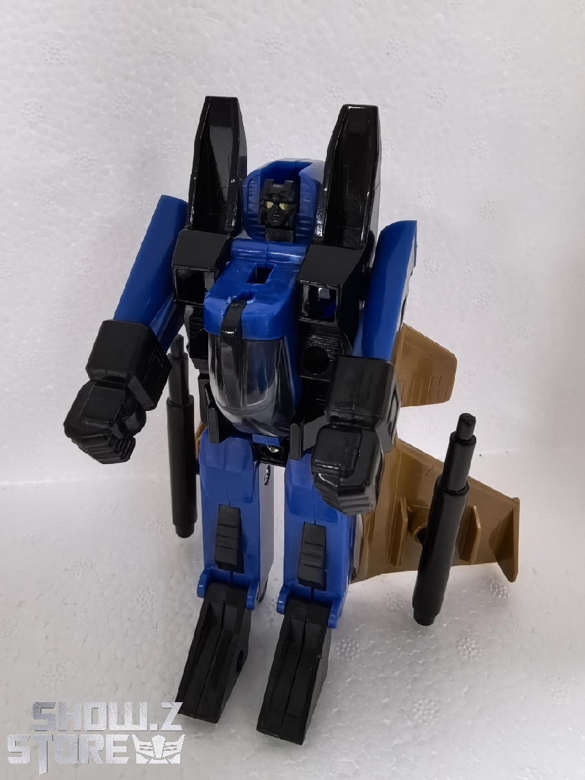 Blue decepticon jet in robot mode with tan parts Blue decepticon jet in robot mode with tan parts