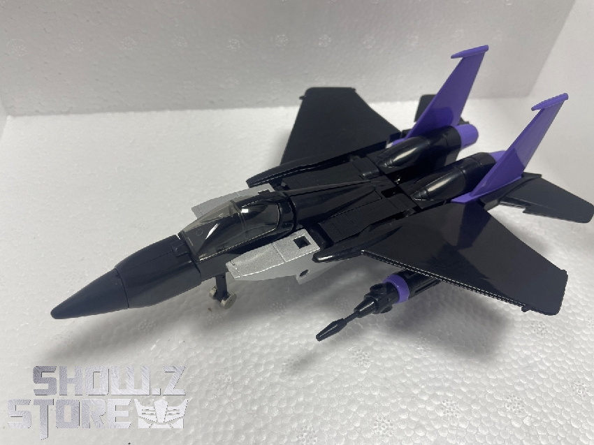 Dark blue and purple fighter jet aircraft form shown Dark blue and purple fighter jet aircraft form shown