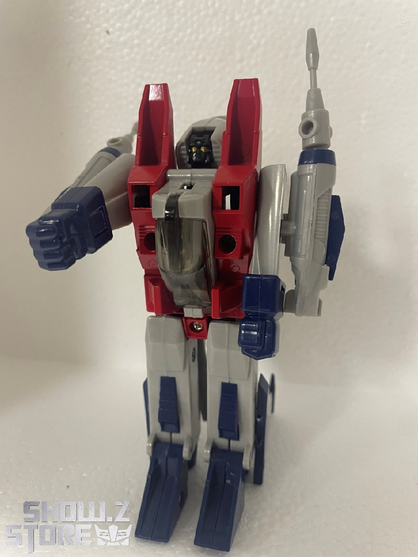 Red and white jet with blue accents transformation Red and white jet with blue accents transformation