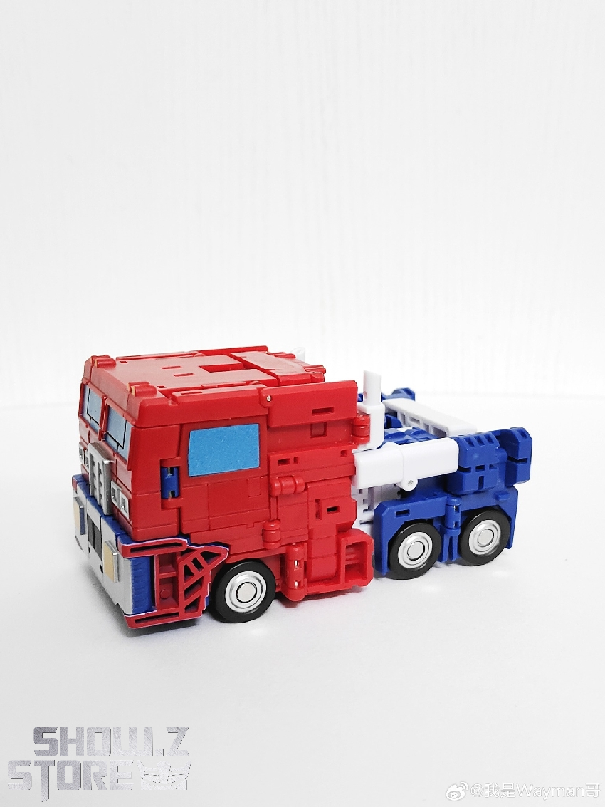 Magic Square MS-G04 Truck Boy robot showing transformation with blue legs and red torso Magic Square MS-G04 Truck Boy robot showing transformation with blue legs and red torso