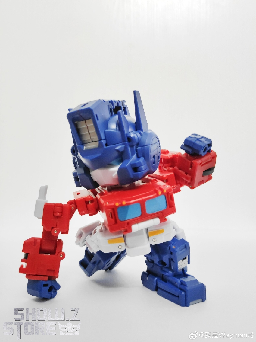 Magic Square MS-G04 Truck Boy Optimus Prime standing in humanoid robot form with weapon Magic Square MS-G04 Truck Boy Optimus Prime standing in humanoid robot form with weapon