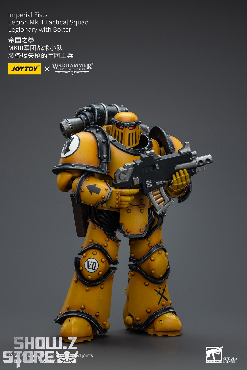 Action ready pose of yellow and black Warhammer Imperial Fists figure Action ready pose of yellow and black Warhammer Imperial Fists figure