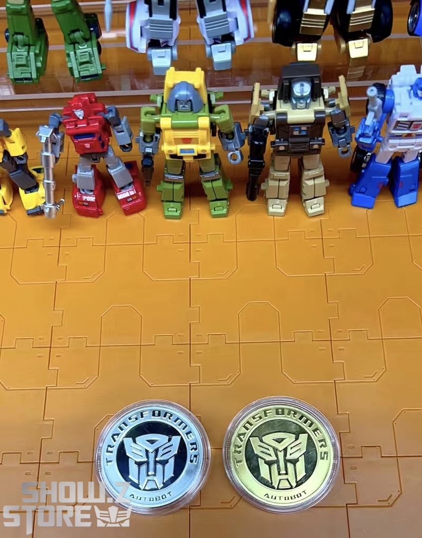 Autobot faction medals displaying Optimus Prime leader insignia Autobot faction medals displaying Optimus Prime leader insignia