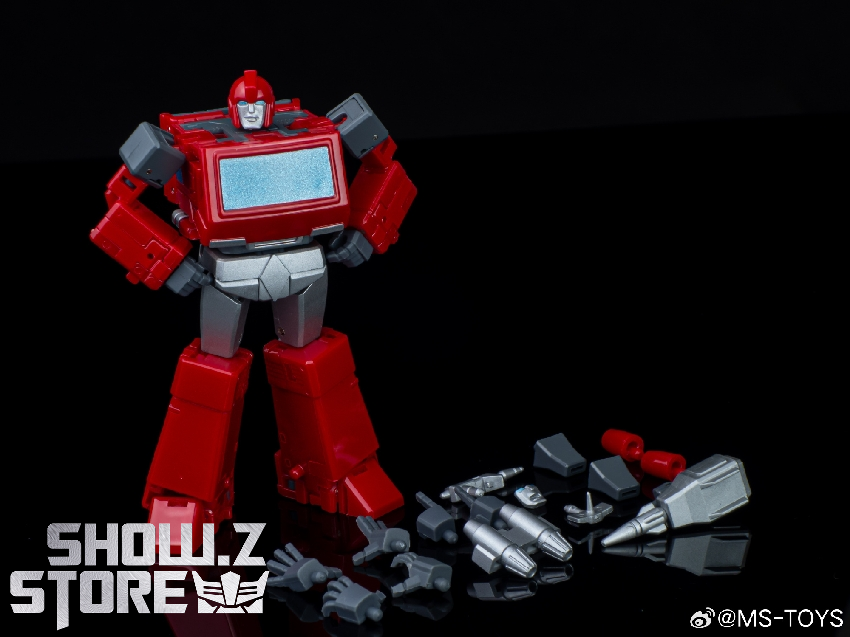 Ironhide robot transformation mode displaying red and gray robot with articulation Ironhide robot transformation mode displaying red and gray robot with articulation