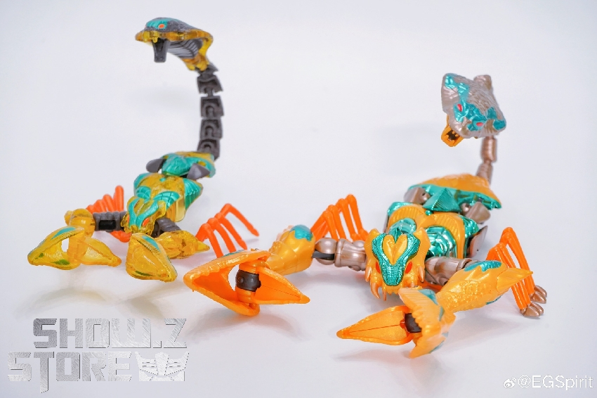 Beast Wars Quickstrike figure displaying complex mechanical structure with orange and gray colorway Beast Wars Quickstrike figure displaying complex mechanical structure with orange and gray colorway